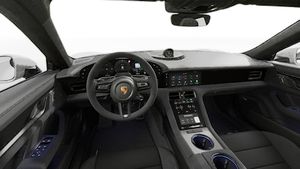 Interior view showing the steering wheel and dashboard of Taycan GTS
