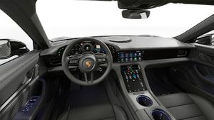 Interior view showing the steering wheel and dashboard of Taycan 4 Black Edition
