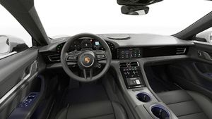 Interior view showing the steering wheel and dashboard of Taycan 4 Cross Turismo