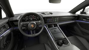 Interior view showing the steering wheel and dashboard of Panamera
