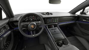 Interior view showing the steering wheel and dashboard of Panamera GTS