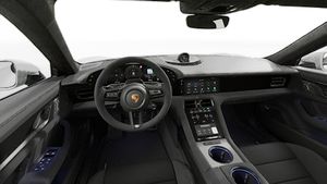 Interior view showing the steering wheel and dashboard of Taycan GTS