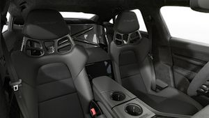 Interior view showing the front seats of Taycan Turbo GT with Weissach Package